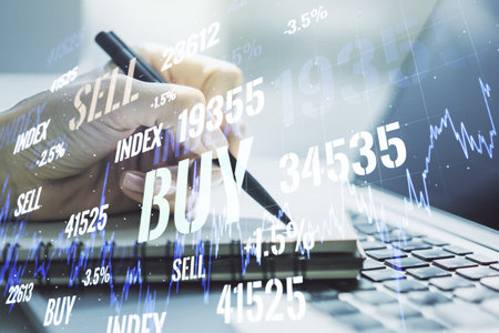 Multi exposure of abstract financial graph with hand writing in notebook on background, financial...