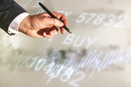 Multi exposure of man hand with pen working with abstract virtual financial graph on blurred office...