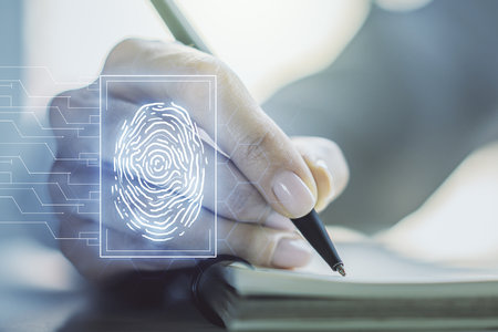 Abstract creative fingerprint illustration with woman hand writing in diary on background, personal biometric data concept. Multiexposureの写真素材