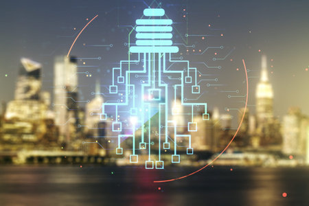 Virtual creative light bulb with chip hologram on blurry office buildings background, artificial...