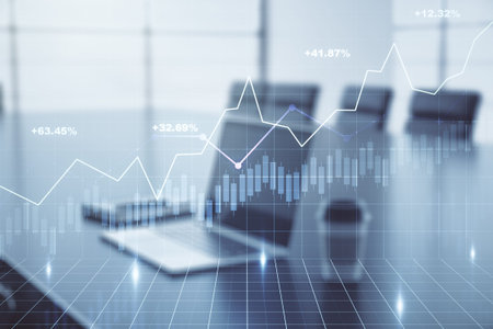 Double exposure of abstract creative financial chart on modern laptop background, research and...