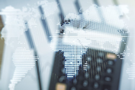 Double exposure of abstract digital world map on blurry calculator background, research and strategy conceptの写真素材