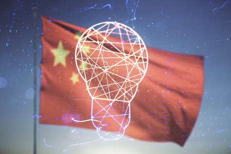 Double exposure of creative light bulb hologram on Chinese flag and blue sky background, research and development conceptの写真素材
