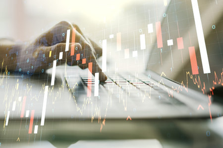 Multi exposure of abstract creative financial graph with world map and hand typing on laptop on...