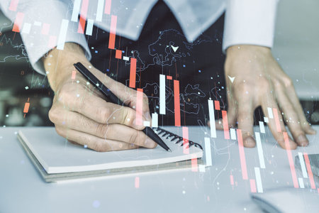 Creative abstract economic crisis chart with world map hologram and hand writing in diary on...
