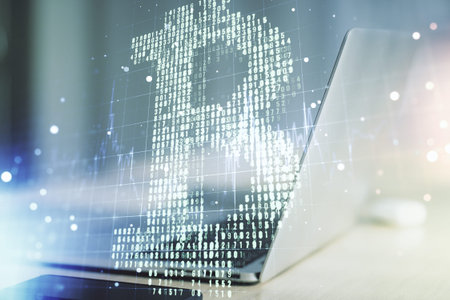 Creative Bitcoin concept with modern laptop background. Multiexposure