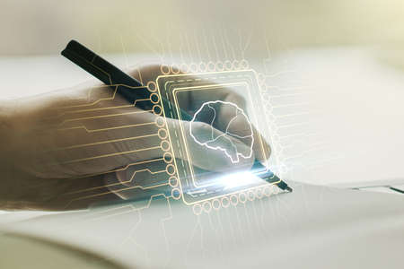 Double exposure of creative human brain microcircuit with man hand writing in notepad on background. Future technology and AI conceptの写真素材