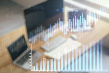 Abstract creative financial graph and modern desktop with pc on background, financial and trading...
