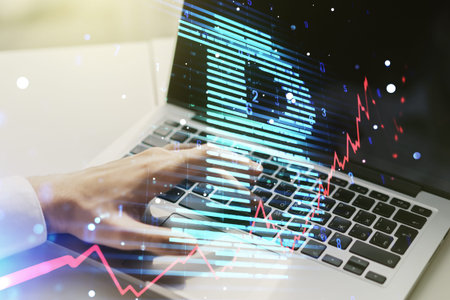 Creative Bitcoin concept with hands typing on computer keyboard on background. Double exposure