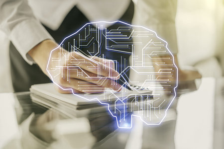Double exposure of creative artificial Intelligence symbol with man hand writing in notebook on...