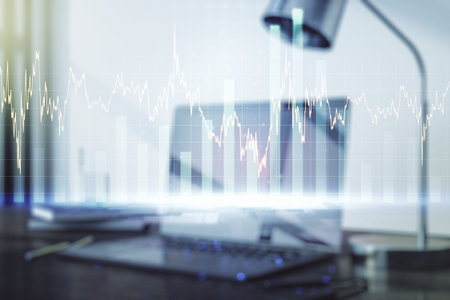 Abstract creative financial graph on modern laptop background, financial and trading concept....