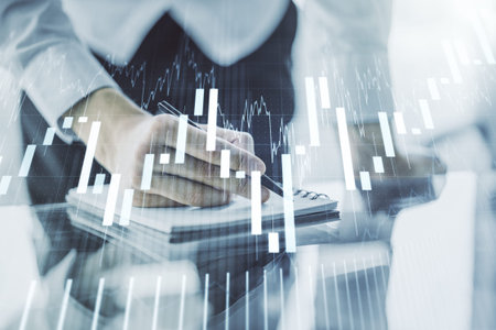 Multi exposure of abstract financial graph with hand writing in notebook on background, financial...