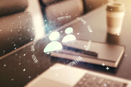 Creative concept of people icons on modern laptop background. Life and health insurance concept. Multiexposureの写真素材