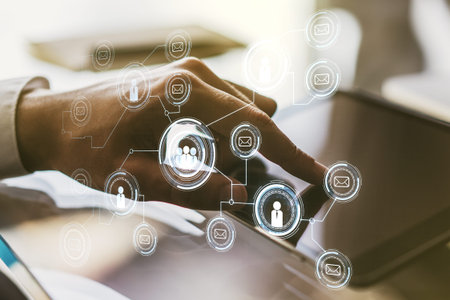 Social network media concept with finger presses on a digital tablet on background. Double exposure