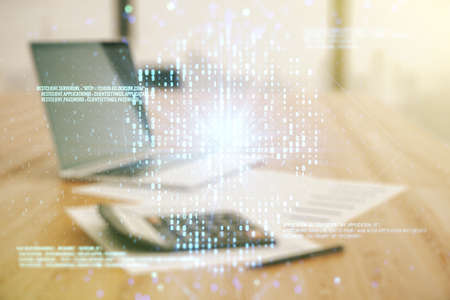 Double exposure of abstract virtual creative code skull hologram on blurry calculator with laptop background. Malware and cyber crime conceptの写真素材