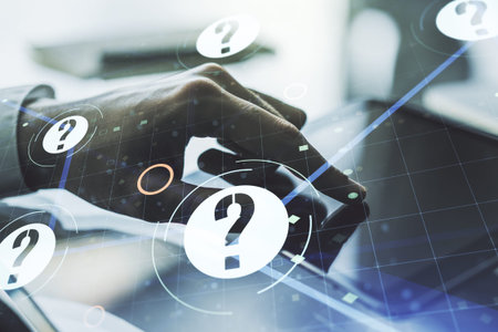 Creative concept of question mark illustration and finger clicks on a digital tablet on background. FAQ and search concept. Multiexposureの写真素材