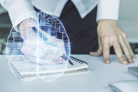 Double exposure of creative artificial Intelligence symbol with hand writing in notebook on...