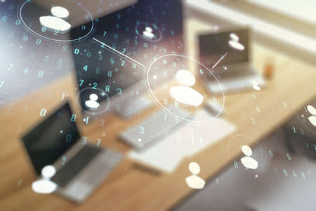 Social network media concept and modern desktop with pc on background. Double exposureの写真素材