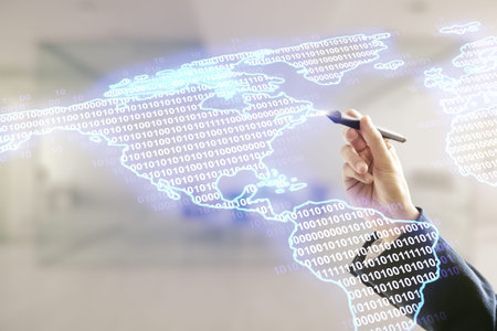 Man hand with pen working with digital map of North America hologram on blurred office background,...