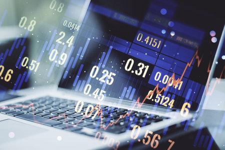 Abstract creative financial graph on modern laptop background, forex and investment concept....