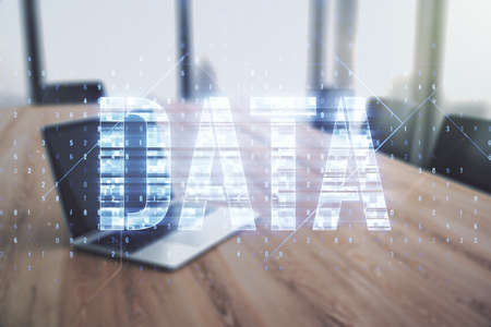 Creative Data word sign on modern laptop background. Multiexposureの写真素材