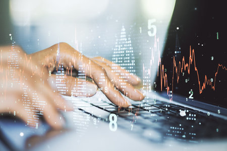 Multi exposure of abstract financial graph with hand typing on laptop on background, financial and...