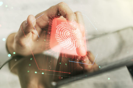 Double exposure of abstract creative fingerprint hologram with finger clicks on a digital tablet on...