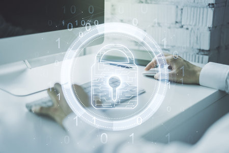Double exposure of creative lock hologram with chip and hands typing on laptop on background....