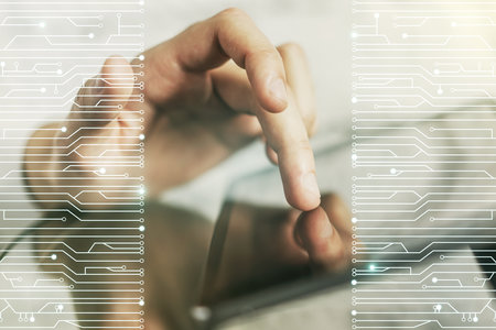 Double exposure of circuit hologram and finger clicks on a digital tablet on background. Research and development hardware conceptの写真素材