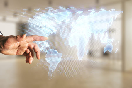 Multi exposure of businessman hand clicks on abstract graphic world map on blurred office...