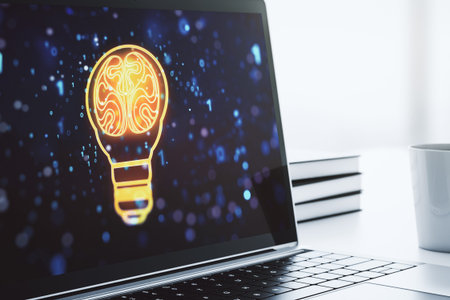 Creative light bulb illustration with human brain on modern computer monitor, future technology...