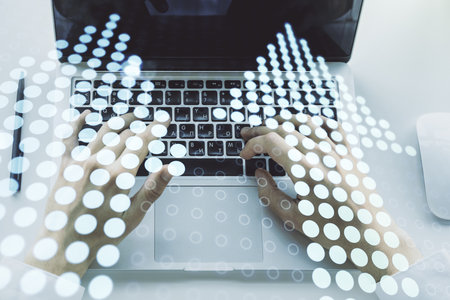 Double exposure of creative abstract upward arrows hologram and hands typing on laptop on background. Ambition and challenge conceptの写真素材