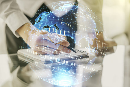 Double exposure of abstract programming language with world map and man hand writing in notebook on...