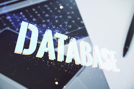 Double exposure of creative Database word hologram on laptop background, research and development conceptの写真素材