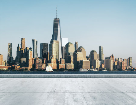 Empty concrete dirty embankment on the background of a beautiful NY city skyline at morning, mock upの写真素材