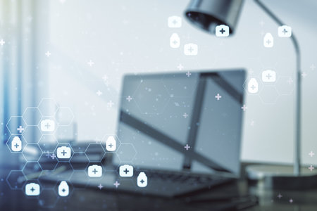 Creative concept of abstract medical illustration on modern laptop background. Medicine and healthcare concept. Multiexposureの写真素材