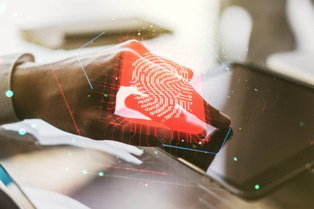 Double exposure of abstract creative fingerprint hologram with finger clicks on a digital tablet on...