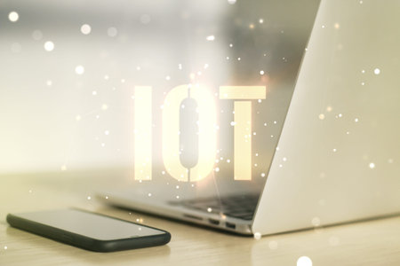 Double exposure of creative IOT hologram on laptop background, research and development concept