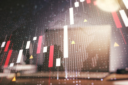 Multi exposure of abstract creative financial graph with world map on modern laptop background, forex and investment conceptの写真素材