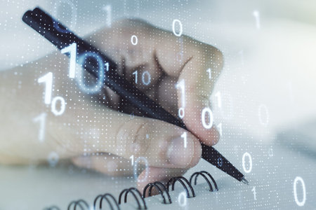 Double exposure of creative abstract binary code hologram and man hand writing in notebook on...