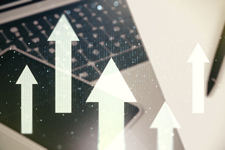 Creative abstract upward arrows hologram on modern computer background, leadership and motivation concept. Multiexposureの写真素材