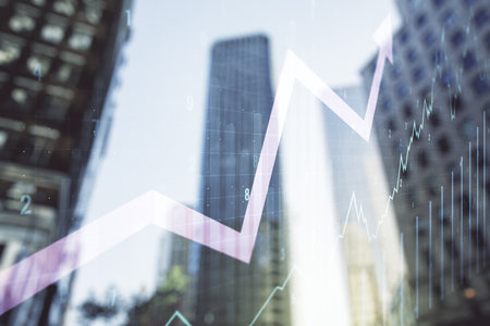Double exposure of abstract creative financial chart and upward arrow illustration on modern skyscrapers background, research and strategy conceptの写真素材