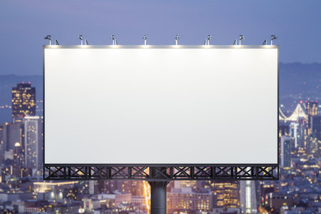 Blank white billboard on cityscape background at evening, front view. Mock up, advertising conceptの写真素材