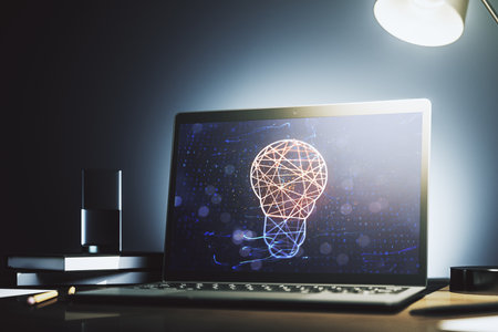 Modern computer monitor with creative light bulb hologram, research and development concept. 3D Renderingの写真素材