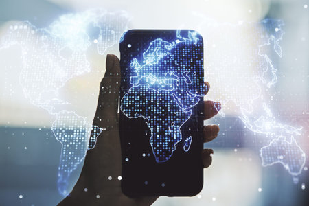 Multi exposure of abstract graphic world map and hand with mobile phone on background, big data and...