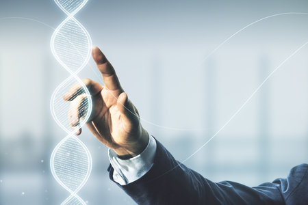 Double exposure of male hand presses on creative DNA hologram on blurred interior background. Bio Engineering and DNA Research conceptの写真素材