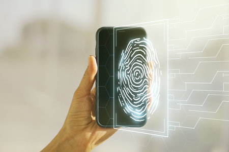 Multi exposure of abstract fingerprint scan interface and hand with cellphone on background, digital access conceptの写真素材