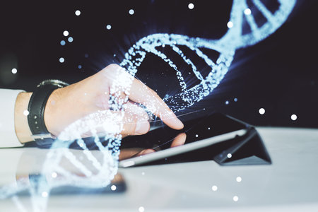 Creative light DNA illustration and finger presses on a digital tablet on background, science and biology concept. Multiexposureの写真素材