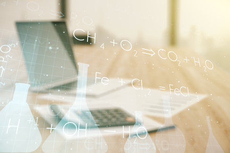 Abstract virtual chemistry illustration on blurry calculator and computer background, science and research concept. Multiexposureの写真素材