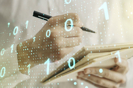 Creative abstract binary code sketch and man hand writing in notepad on background, hacking and matrix concept. Multiexposureの写真素材